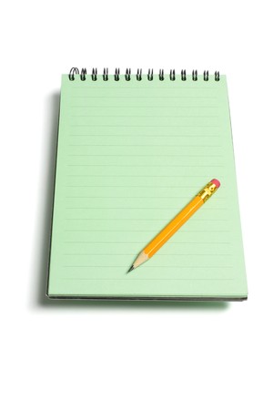 Note Pad and Pencil on white Backgroundの写真素材