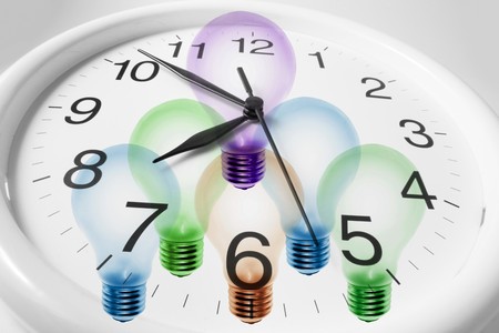 Composite of Clock and Light Bulbsの写真素材