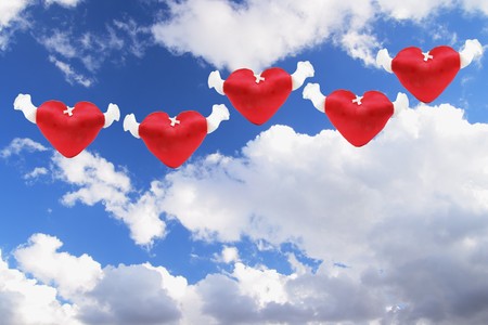 Love Hearts and Cloudy Blue Skyの写真素材