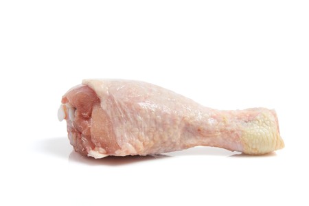 Raw Chicken Drumstick on White Backgroundの写真素材