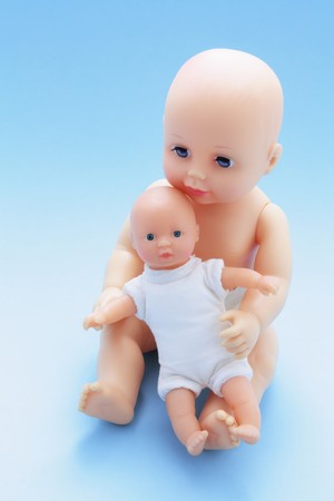 Dolls on Blue Backgroundの写真素材