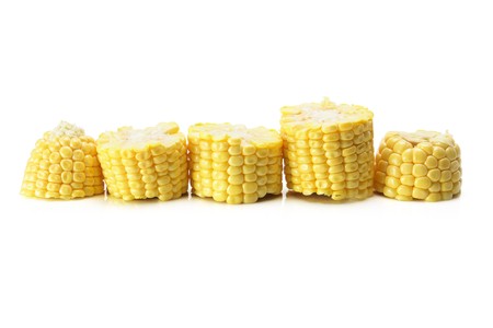 Slices of Corn Cob on White Backgroundの写真素材
