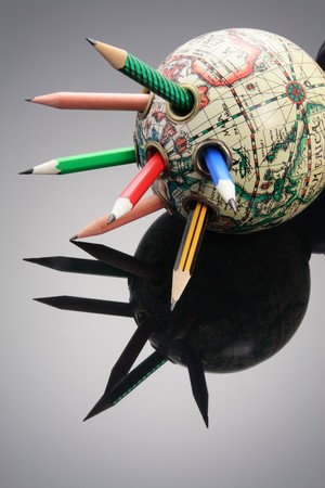 Antique Globe Pen Holder with Reflectionの写真素材