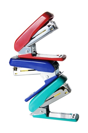 Stack of Staplers on White Backgroundの写真素材