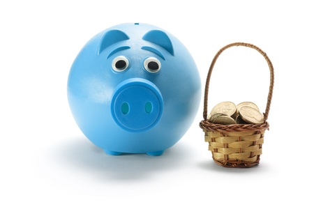 Piggy Bank and Basket of Coins on White Backgroundの写真素材