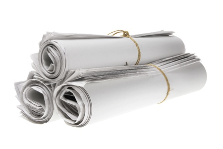 Rolls of Newspapers on White Backgroundの写真素材