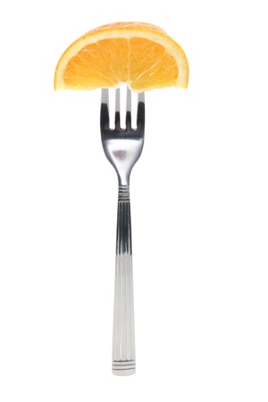 Piece of Orange on Fork with White Backgroundの写真素材