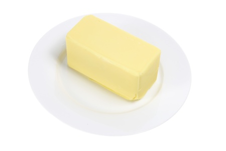 Butter on Plate with White Backgroundの写真素材