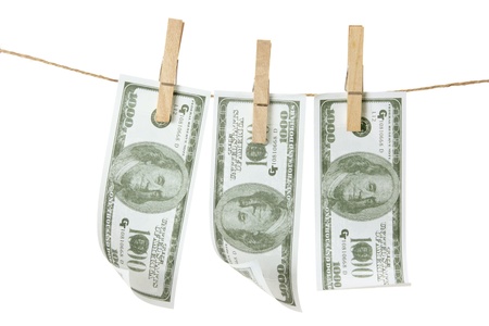Clothes Line with Dollar Notes on White Background