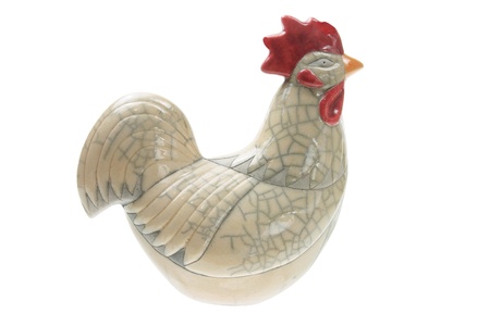 Rooster Figurine on White Backgroundの写真素材