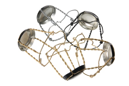 Wire Caps for Champagne Corks on White Backgroundの写真素材