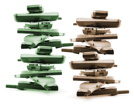 Stacks of Mobile Phones on White Background