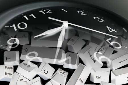 Composite of Clock and Computer Keysの写真素材