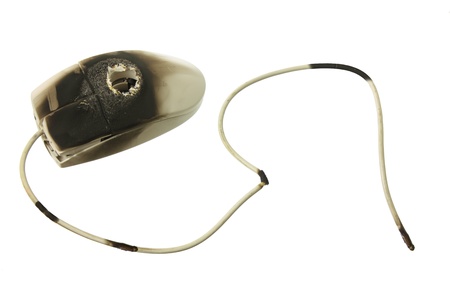 Burnt Computer Mouse on White Backgroundの写真素材