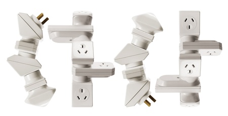 Stacks of Power Adaptors on White Background