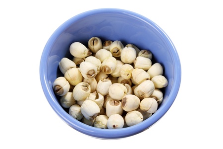Lotus Seeds in Bowl on White Backgroundの写真素材