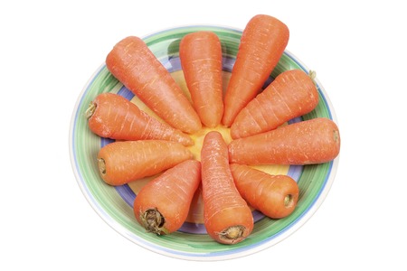 Baby Carrots on Plate with White Backgroundの写真素材