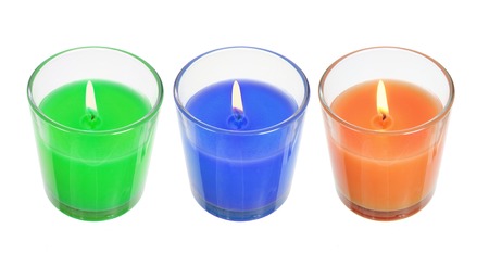 Candles in Glasses on White Backgroundの写真素材