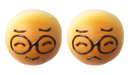 Smiley Sweet Buns on White Backgroundの写真素材
