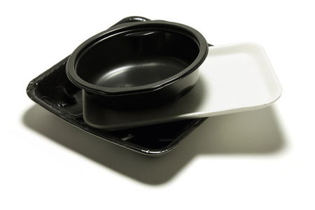 Stack of Food Trays on White Backgroundの写真素材