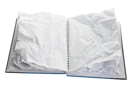 Notebook with Crumpled Pages on White Backgroundの写真素材