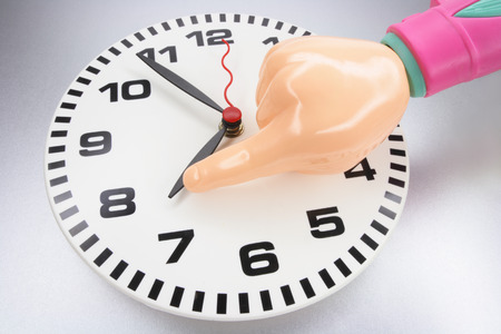 Plastic Hand and Wall Clockの写真素材