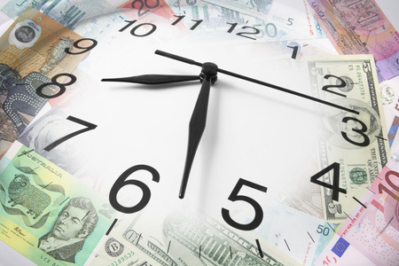 Composite of Clock and Bank Notesの写真素材