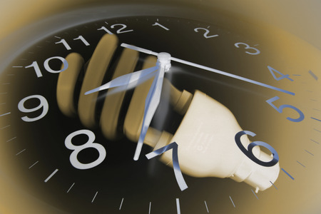 Composite of Wall Clock and Light Bulbの写真素材