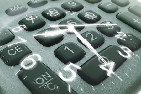 Composite of Clock Hands and Calculator Keysの写真素材