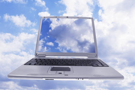 Composite of Laptop and Cloudsの写真素材