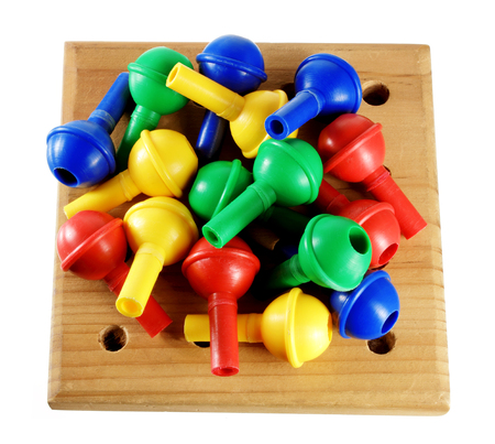 Peg Board Game on White Backgroundの写真素材