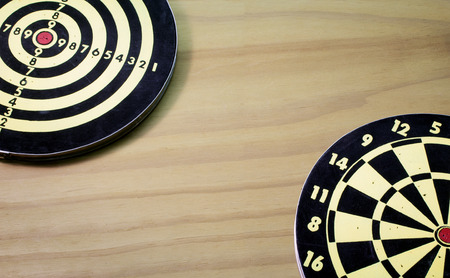Dart Boards on Wooden Backgroundの写真素材