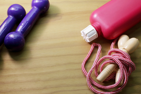 Exercise Products on Wooden Backgroundの写真素材