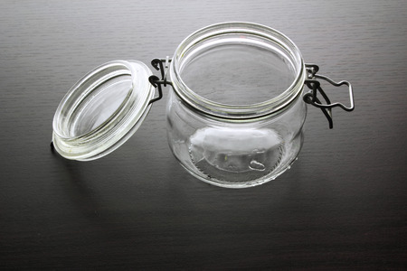 Glass Jar on Wooden Backgroundの写真素材