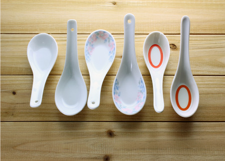 Chinese Soup Spoons on Wooden Backgroundの写真素材