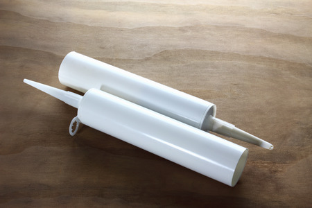 Silicone Tubes on Wooden Backgroundの写真素材