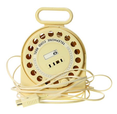 Retractable Phone Cord on White Backgroundの写真素材