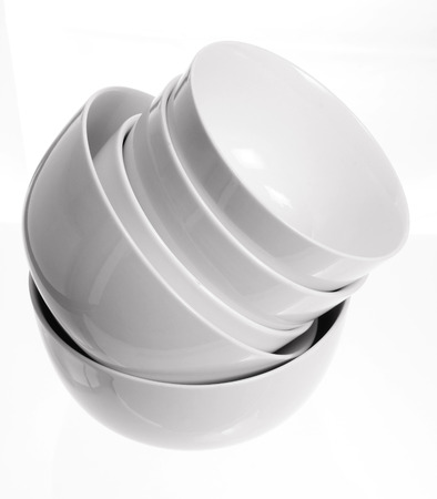 Stack of Bowls on White Backgroundの写真素材