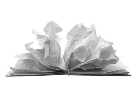 Notebook with Crumpled Pages on White Backgroundの写真素材