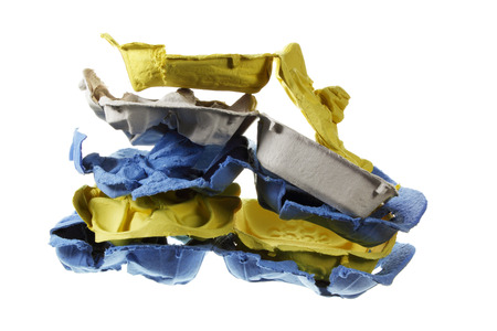 Stack of Egg Cartons on White Backgroundの写真素材