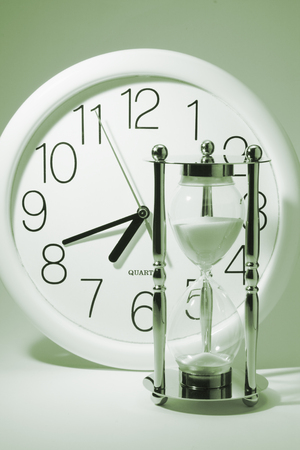 Clock and Hourglassの写真素材