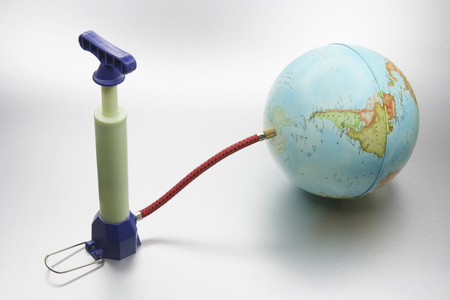Globe and Pump on Seamless Backgroundの写真素材