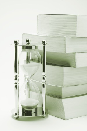 Hourglass and Booksの写真素材