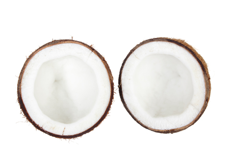 Halves of Coconut on White Backgroundの写真素材