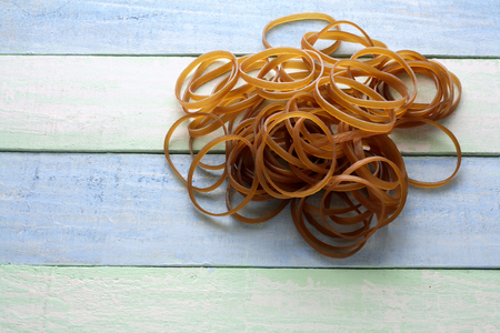 Rubber Bands on Wooden Backgroundの写真素材