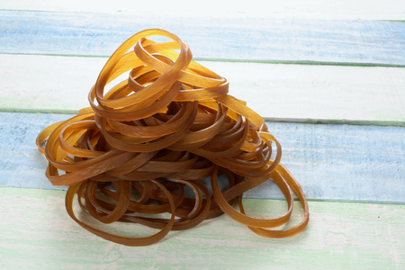Rubber Bands on Wooden Backgroundの写真素材