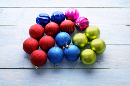 Christmas Baubles on Wooden Backgroundの写真素材