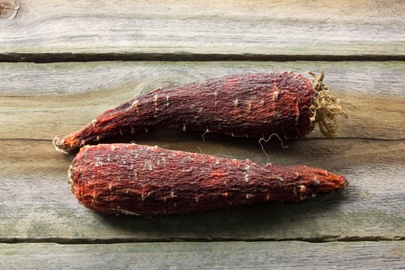 Rotten Carrots on Wooden Backgroundの写真素材
