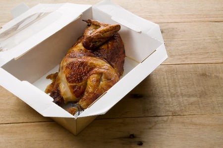Roast Chicken on Wooden Backgroundの写真素材