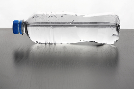 Water Bottle on Wooden Backgroundの写真素材